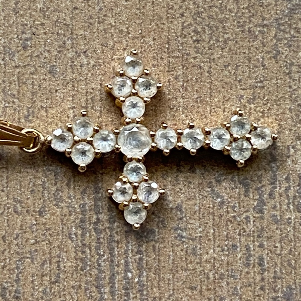 Cross Charm says 14 karat on the hook only